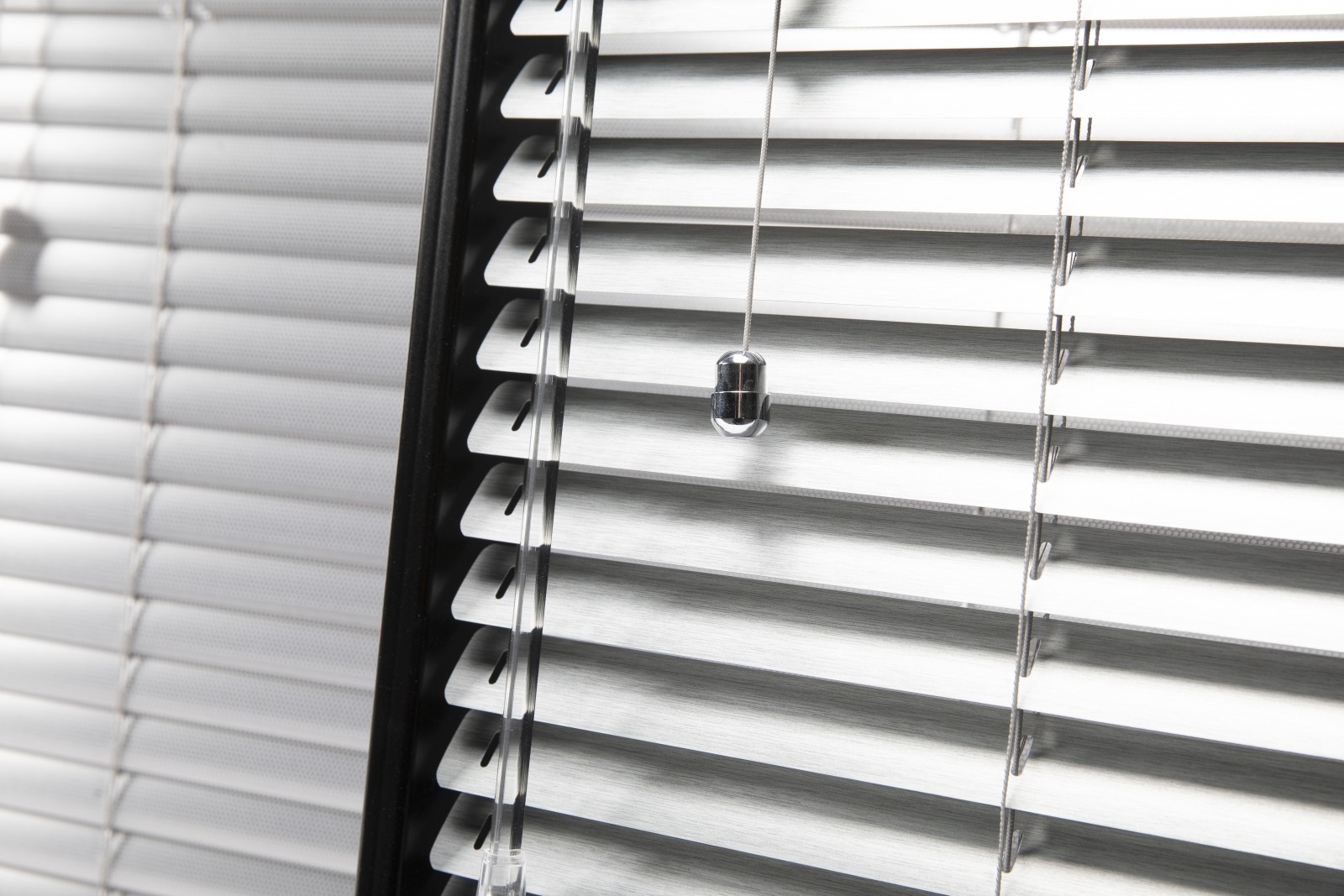 Close up of Aluminium Venetian Blind with Chrome Acorn