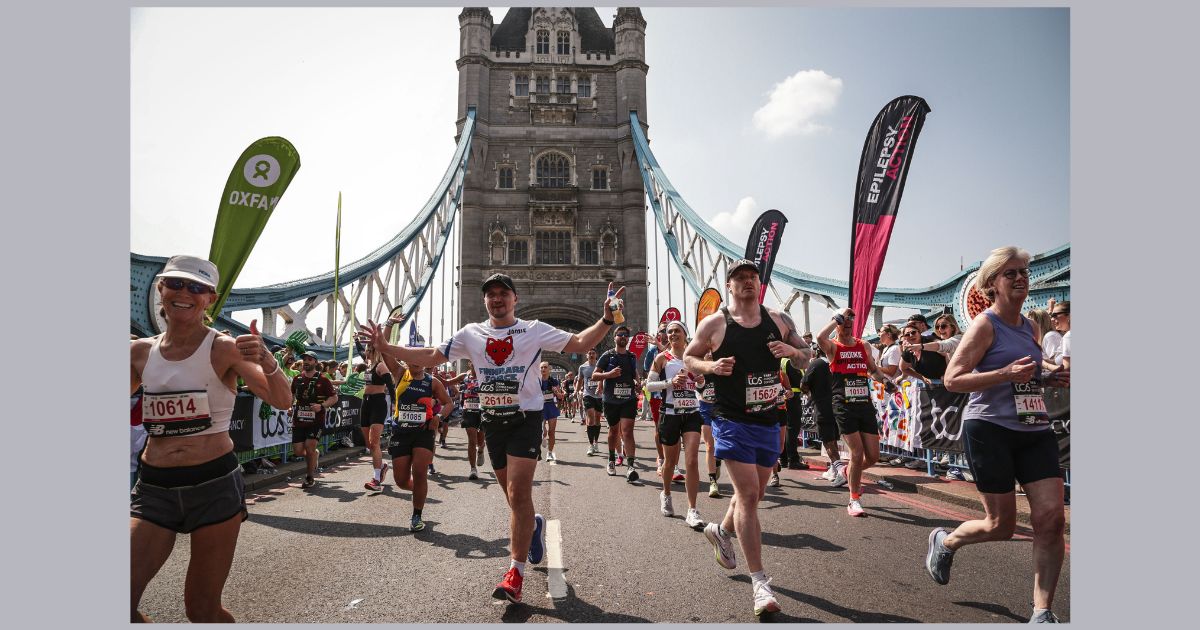 Andrew Payne runs past London Bridge